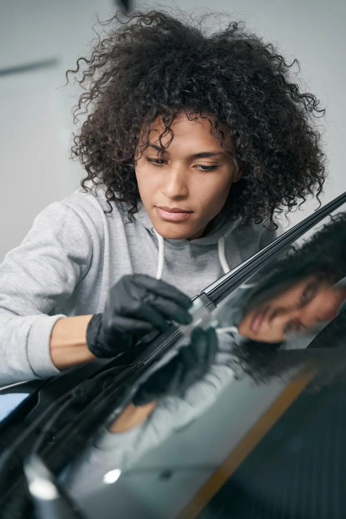 worker ceramic coating windscreen surface aft 2023 11 27 05 28 58 utc 1